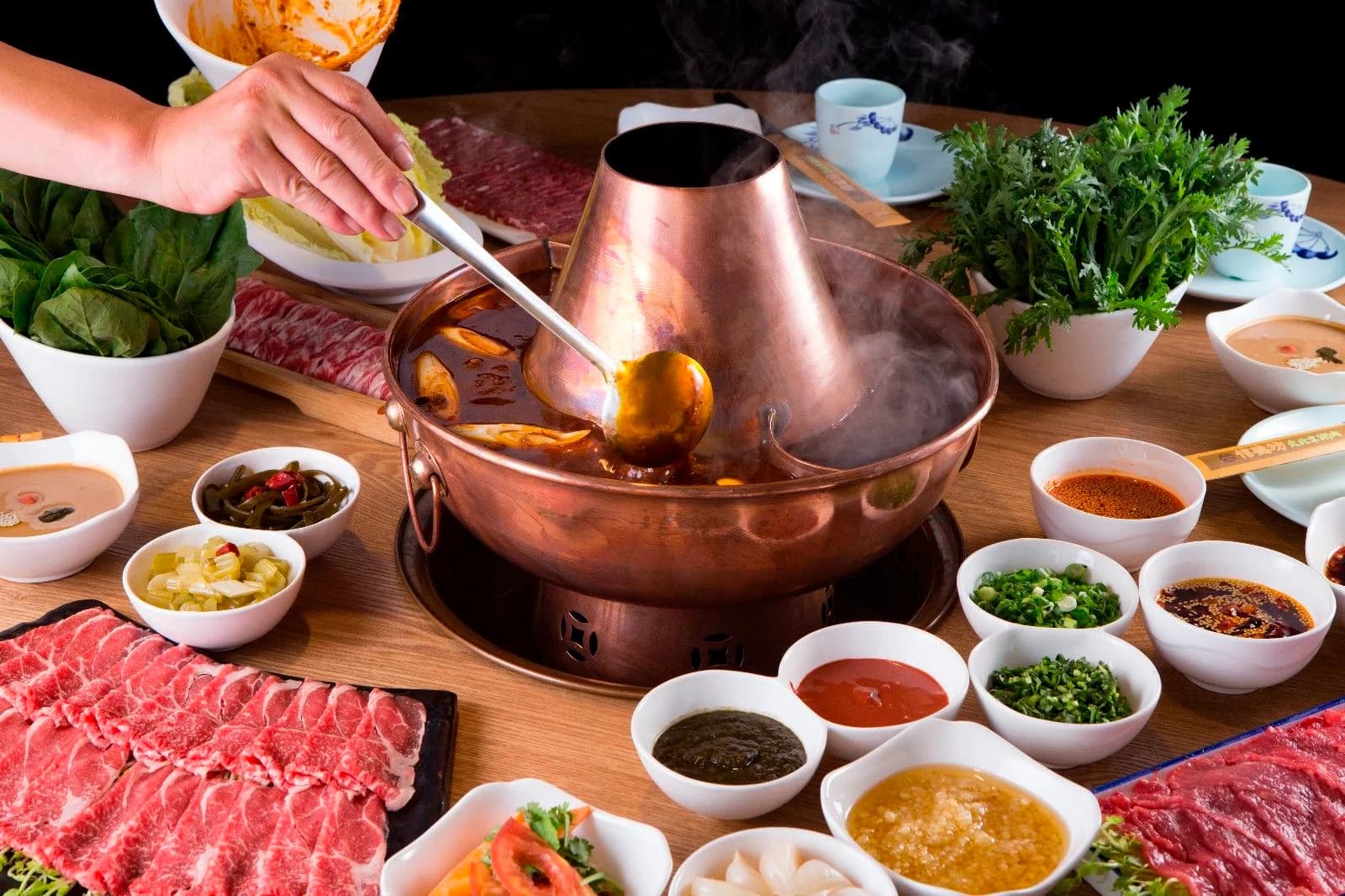 Traditional Beijing hot pot with lamb slices